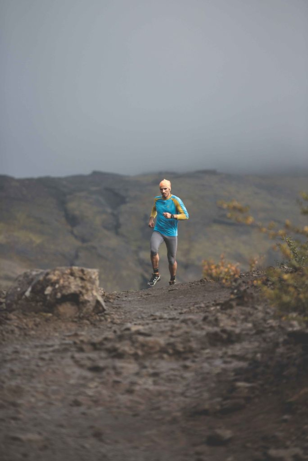 A man running in the highlands of Iceland