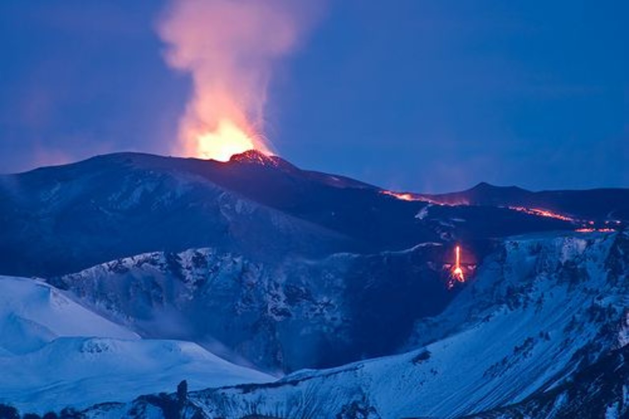 The volcanic eruption at Fimmvörðuháls. Lava spewing out the top of the hill