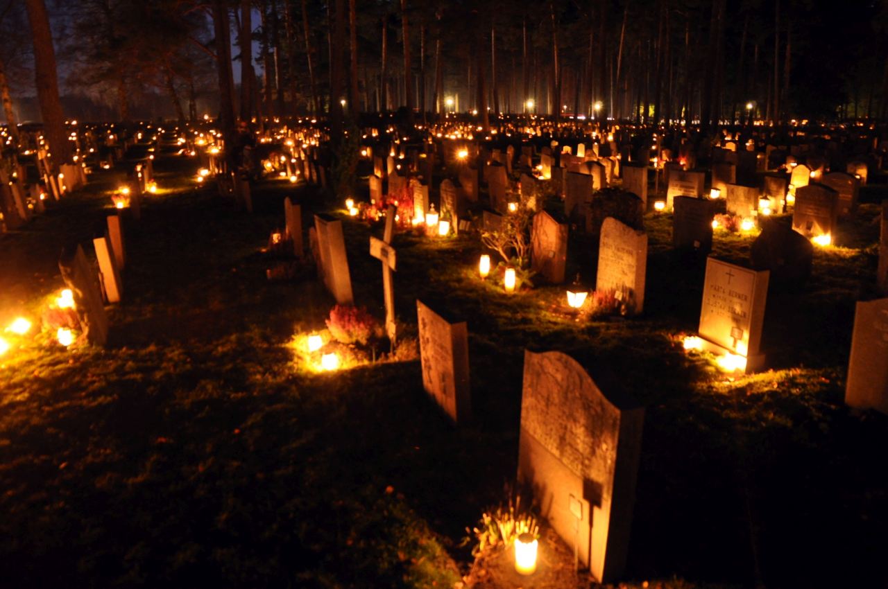 Cemetery during Christmas decorated with candles.