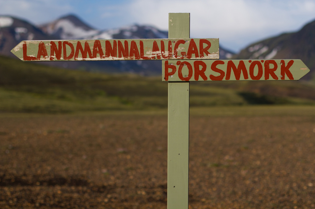 A sign in the Icelandic highlands that says Landmannalaugar to the left and Thorsmork to the right.